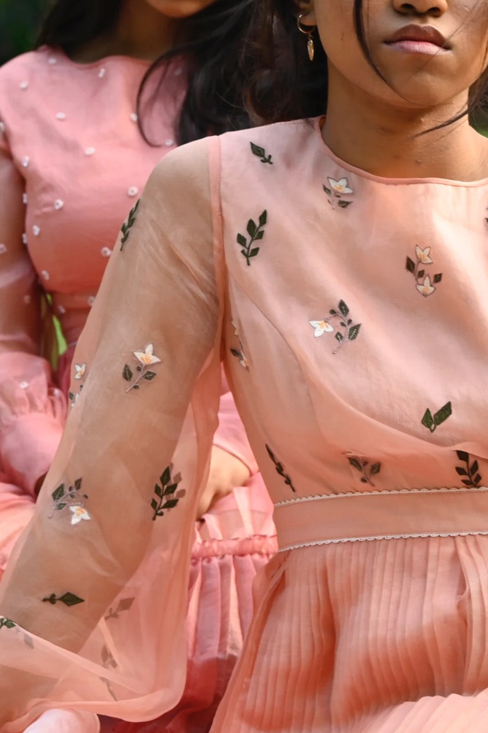 Peach floral embroidered skater dress.
