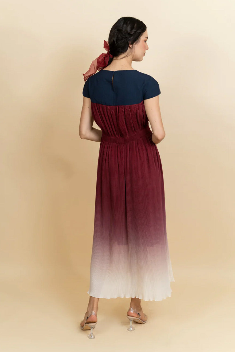Floral embroidered neckline in a full length dress. (Blue)