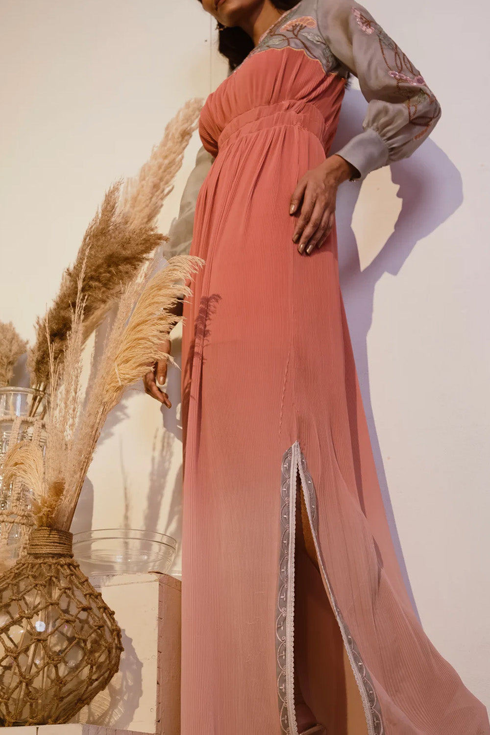 Narrow pleated orange dress