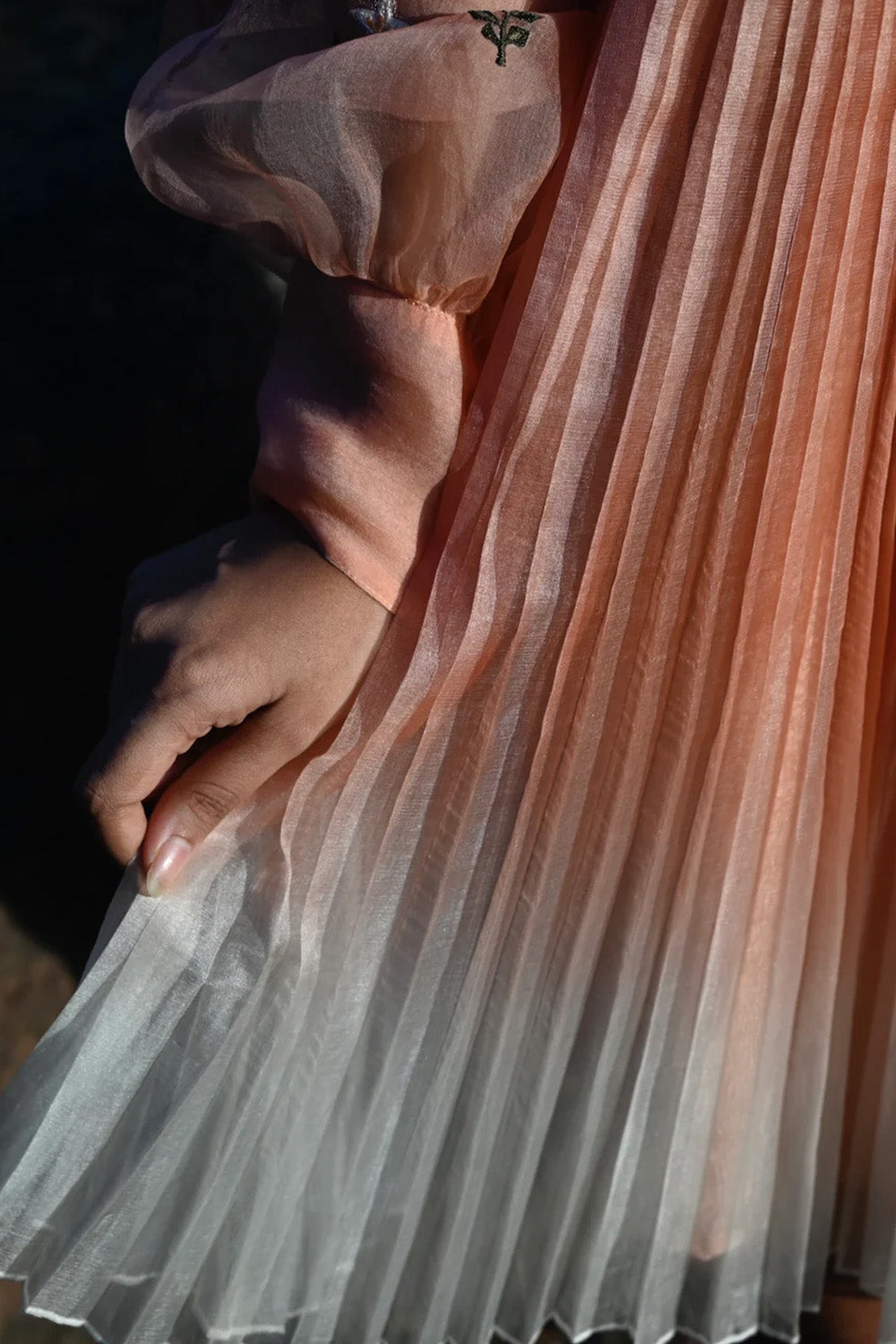 Peach floral embroidered skater dress.