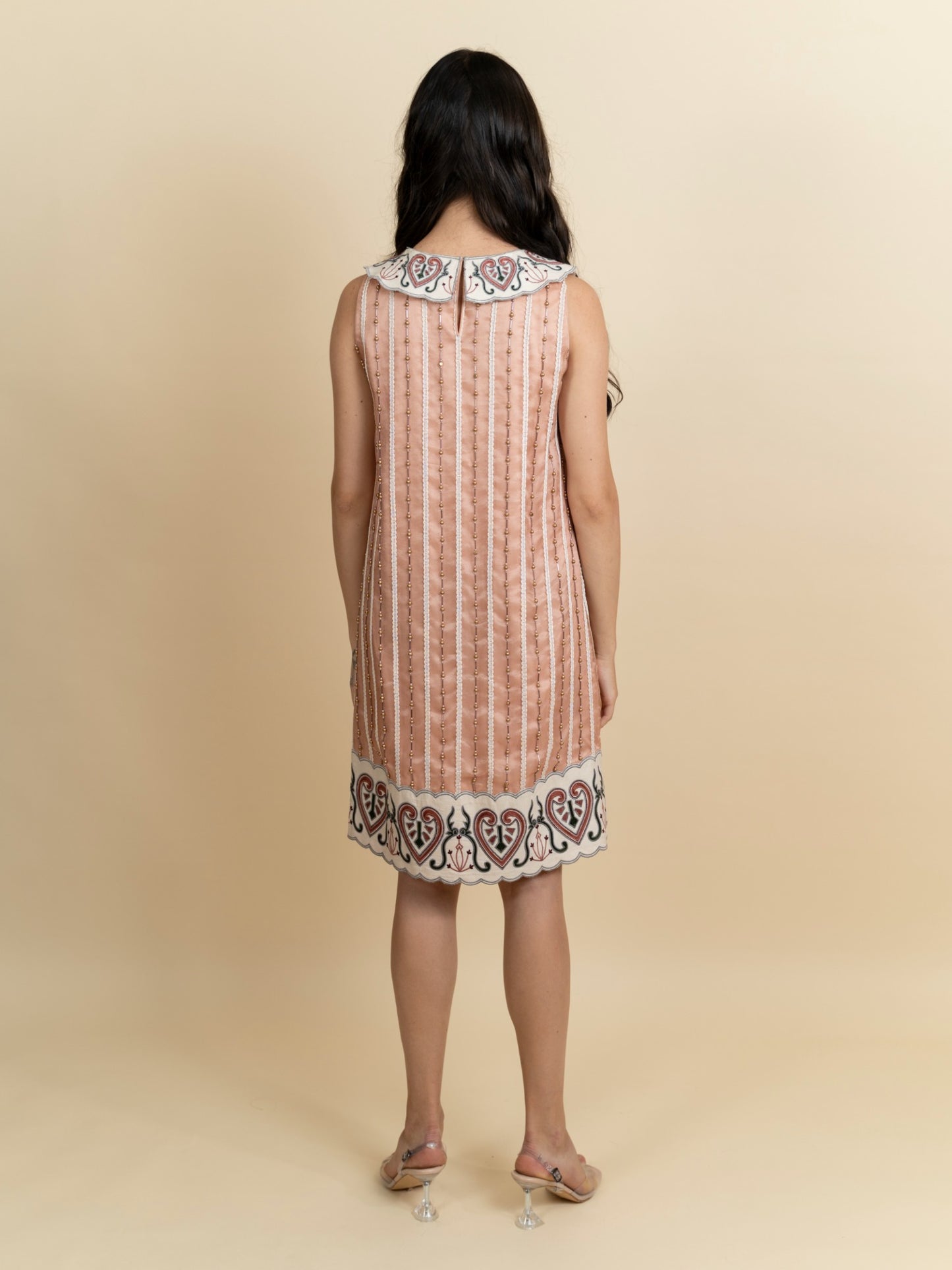 Galaxy embroidered knee length peach dress. image 3