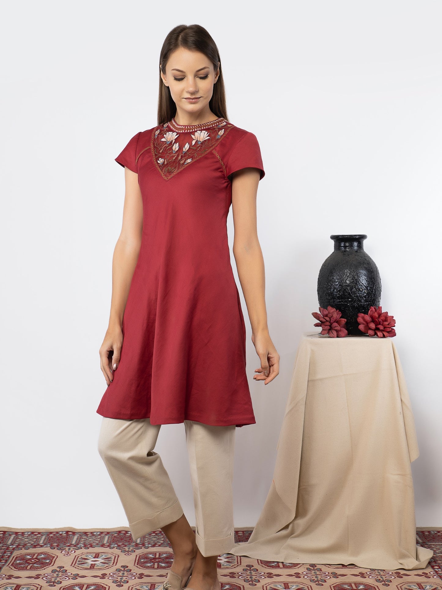 Red tunic with linen pants. image 1