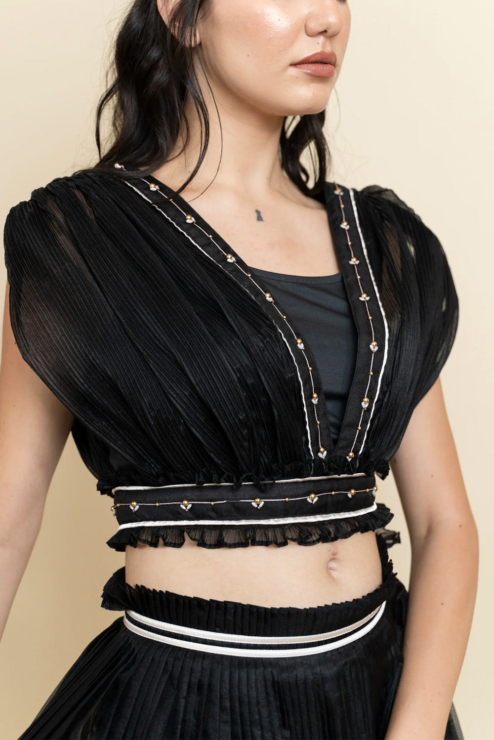 Draped organza top with pleated skirt. (Black)