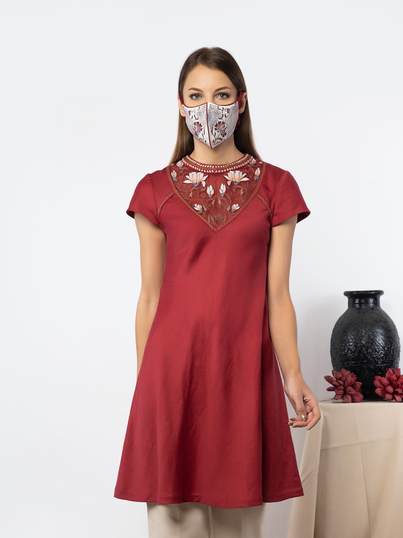 Red tunic with linen pants. image 0