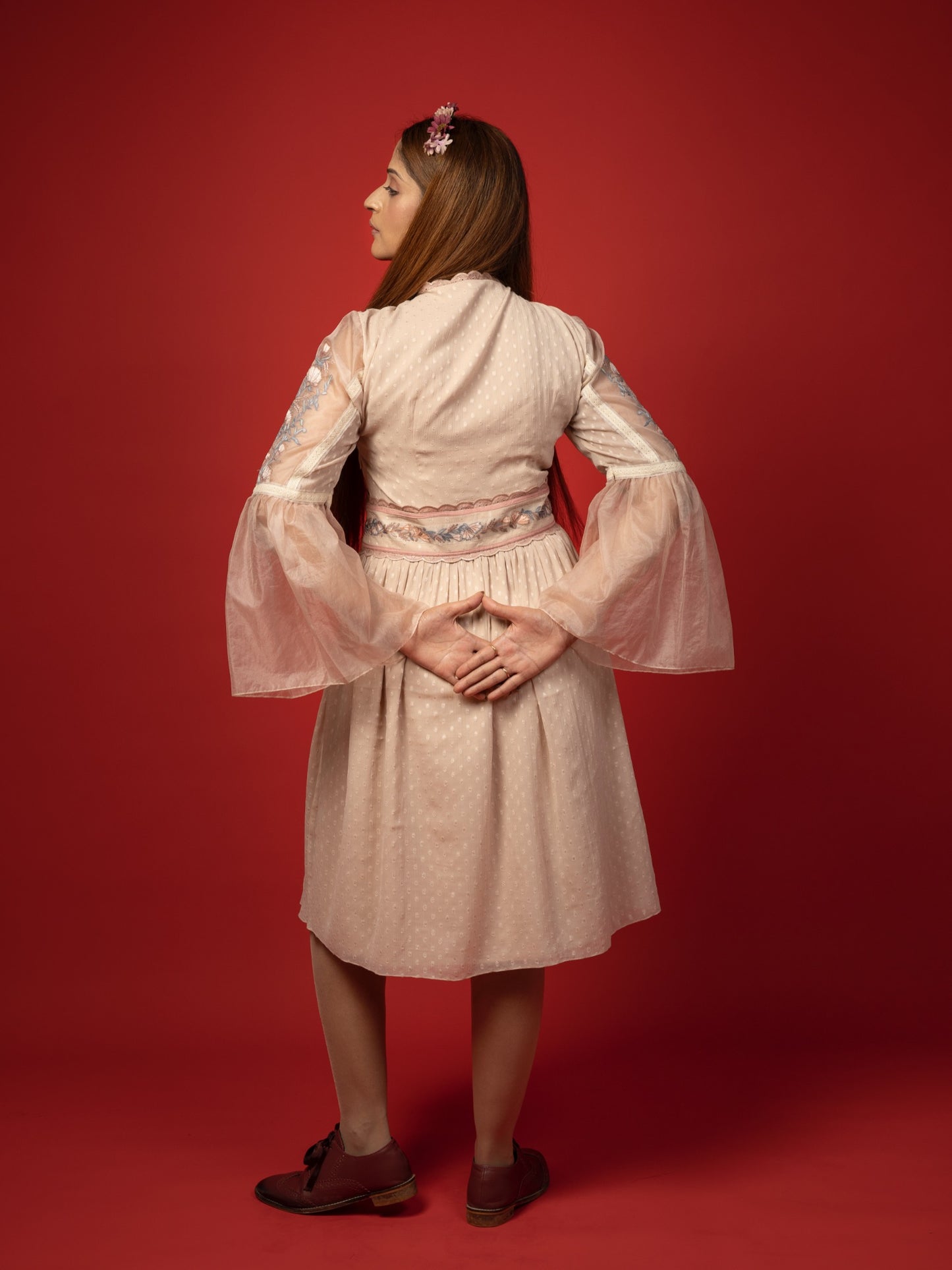 Rose gold mid length dress. image 2