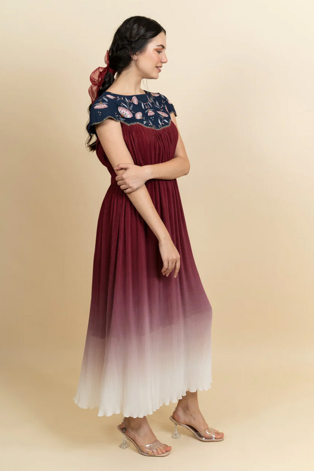 Floral embroidered neckline in a full length dress. (Blue)