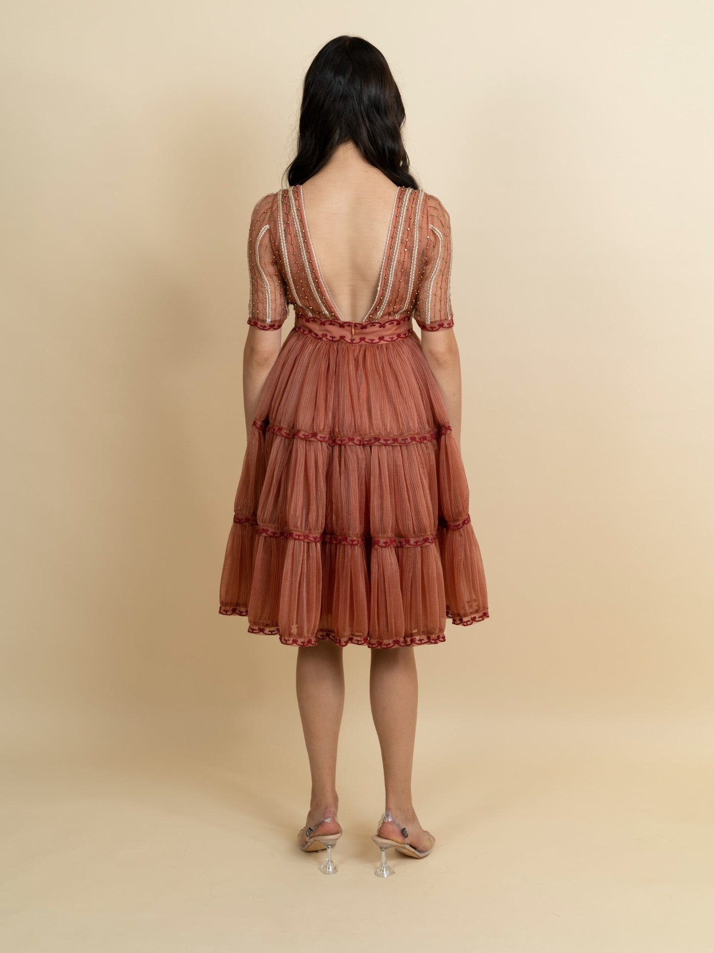 Golden galaxy embroidery in narrow pleated dress. image 3