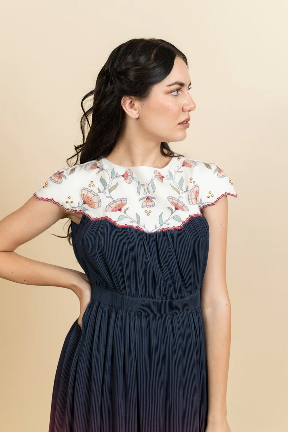 Embroidered neckline in a Georgette full length dress. (Ivory)