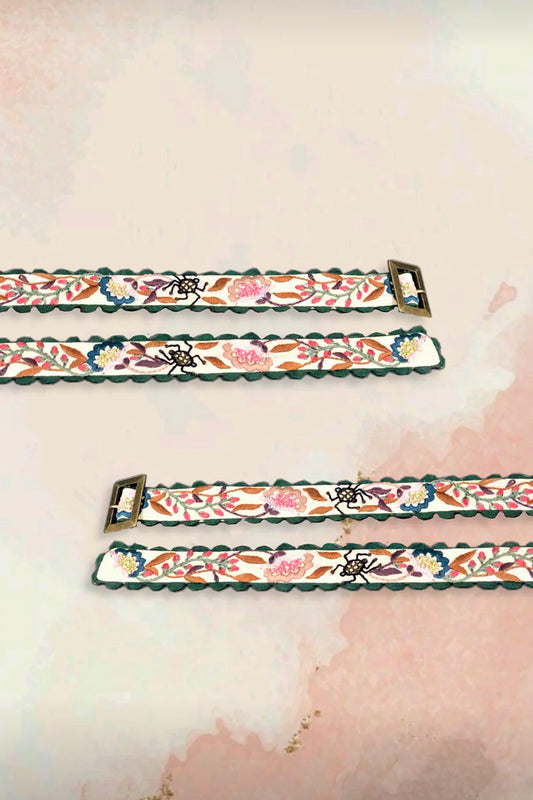 Multi-colored embroidered belt.