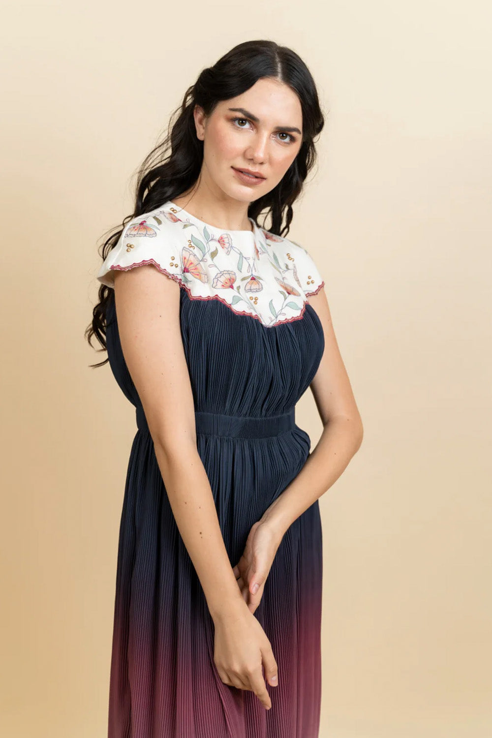 Embroidered neckline in a Georgette full length dress. (Ivory)