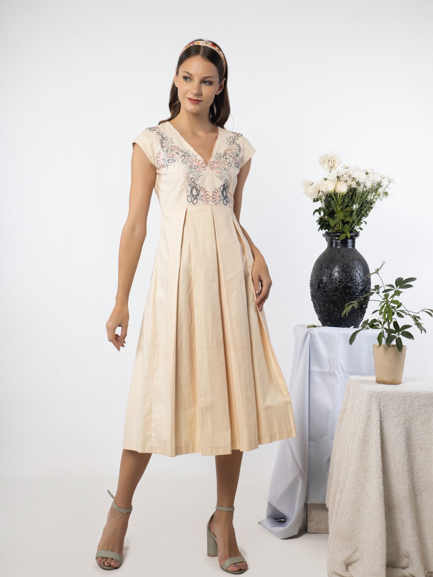Box pleated calf length dress. image 1