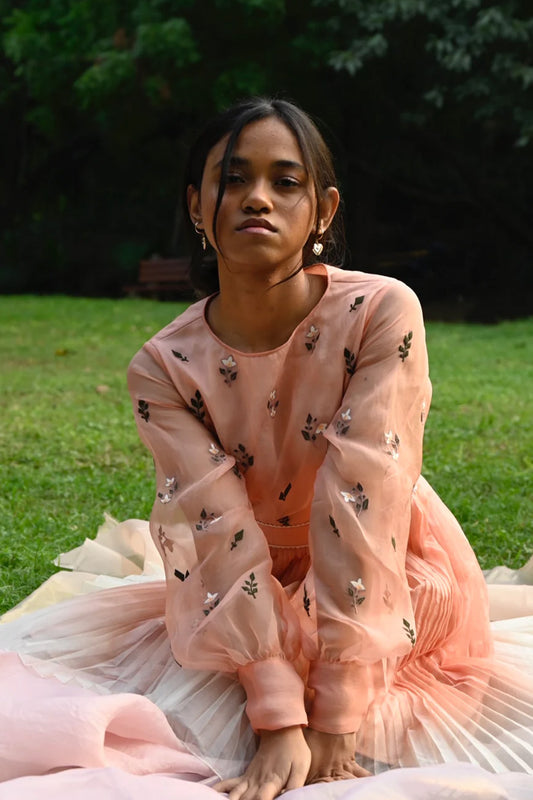 Peach floral embroidered skater dress.