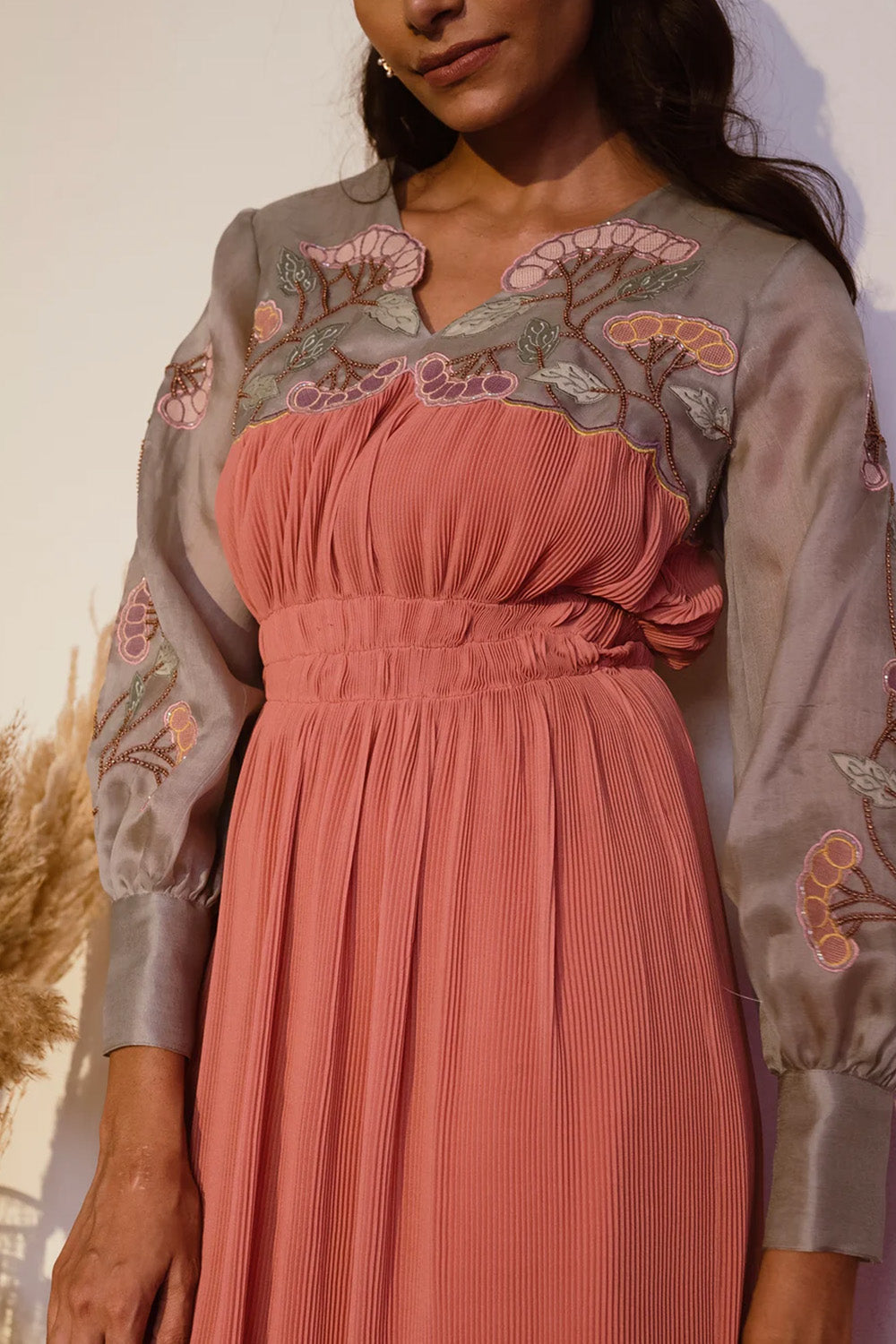 Narrow pleated orange dress