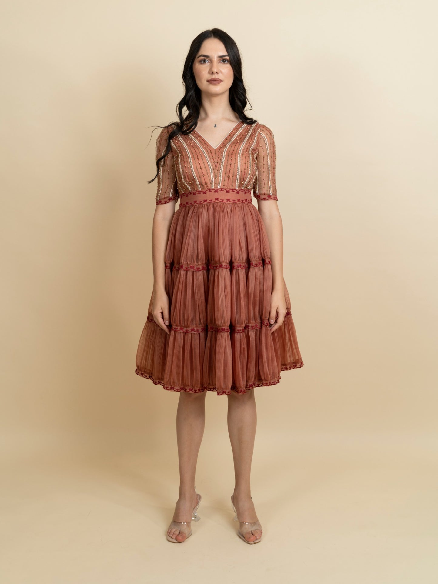 Golden galaxy embroidery in narrow pleated dress. image 2