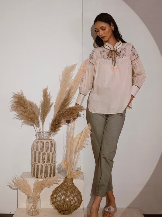 Off white embroidered top with olive pants image 0