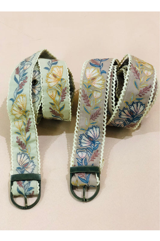White detailed floral embroidered belt. image 1