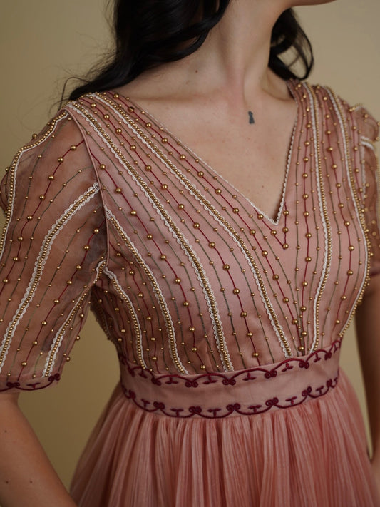 Golden galaxy embroidery in narrow pleated dress. image 1
