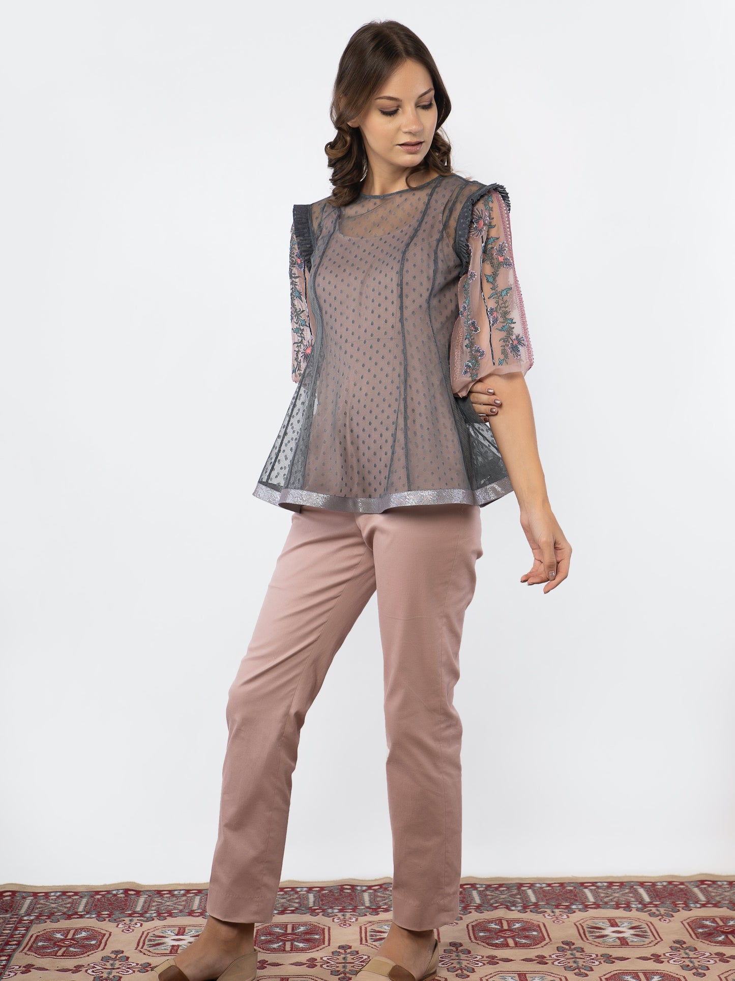 Blue shear top with rose gold jumpsuit. image 0