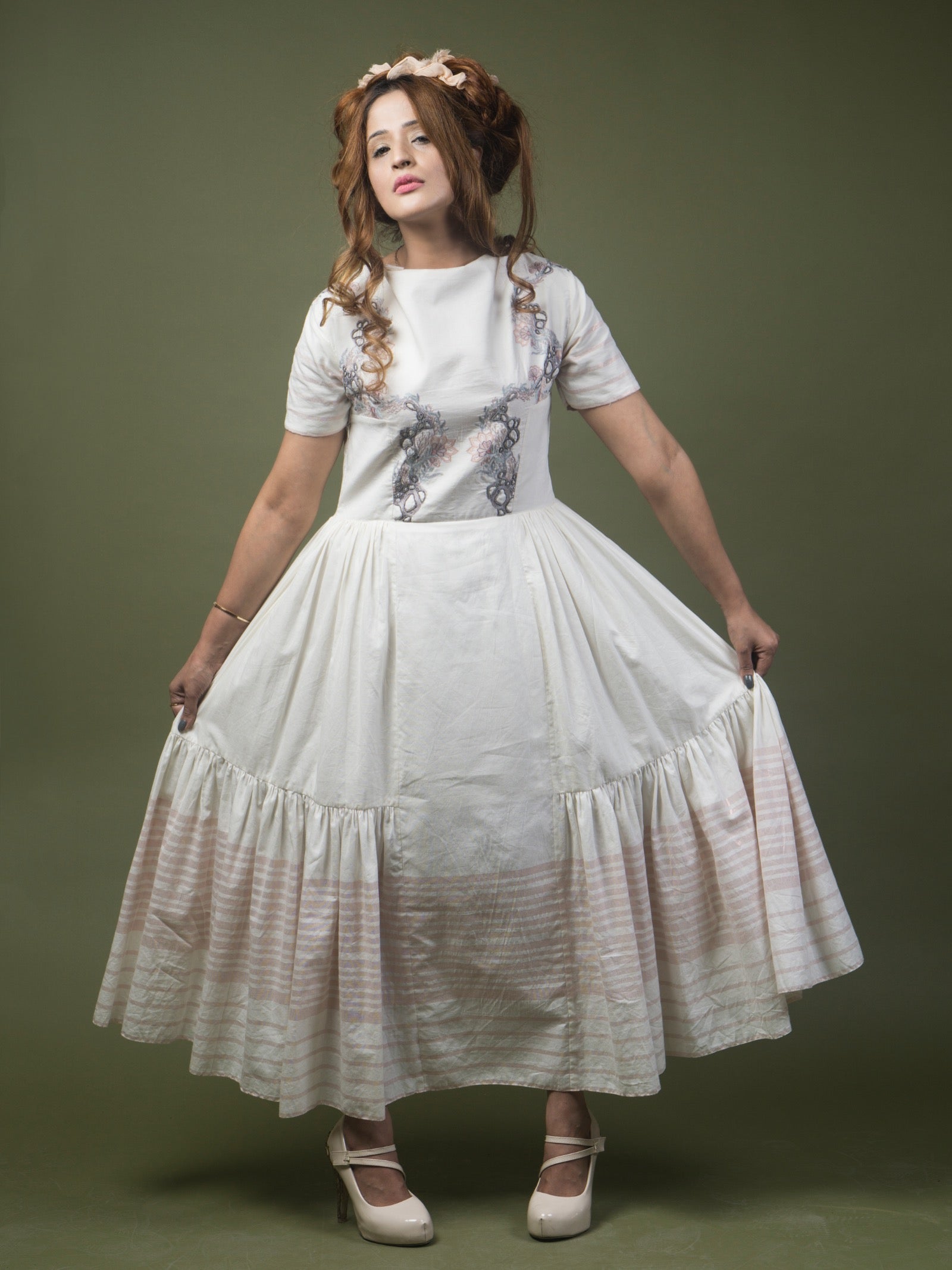 Floral embroidered calf length dress. image 1