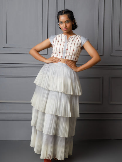Embroidered top with multi layered pleated skirt. image 0