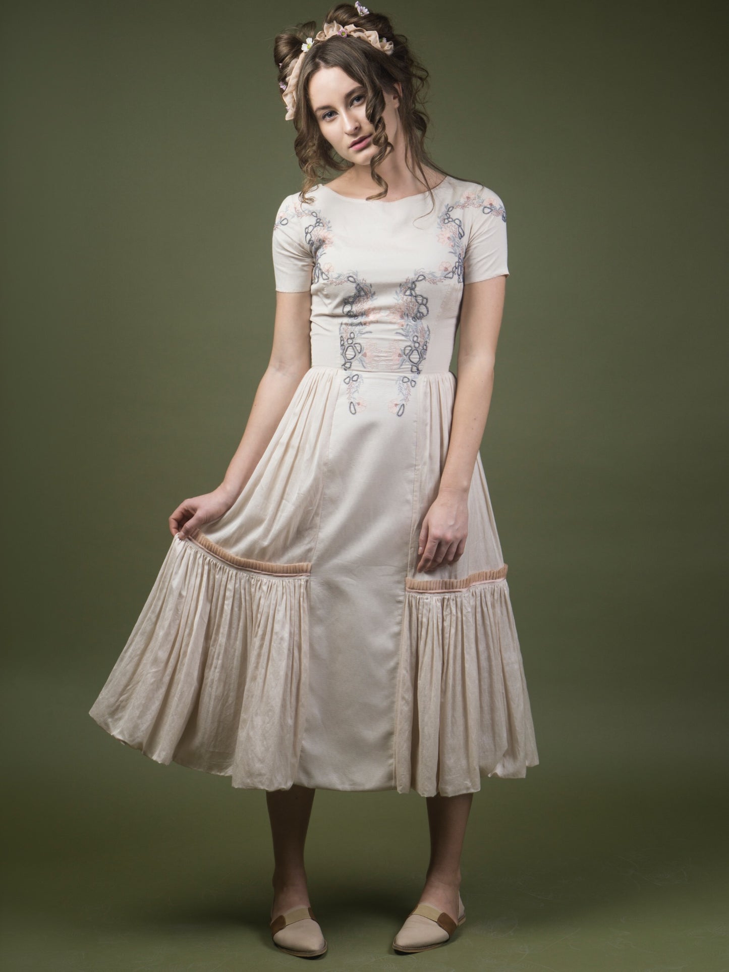 Floral embroidered calf length dress. image 0
