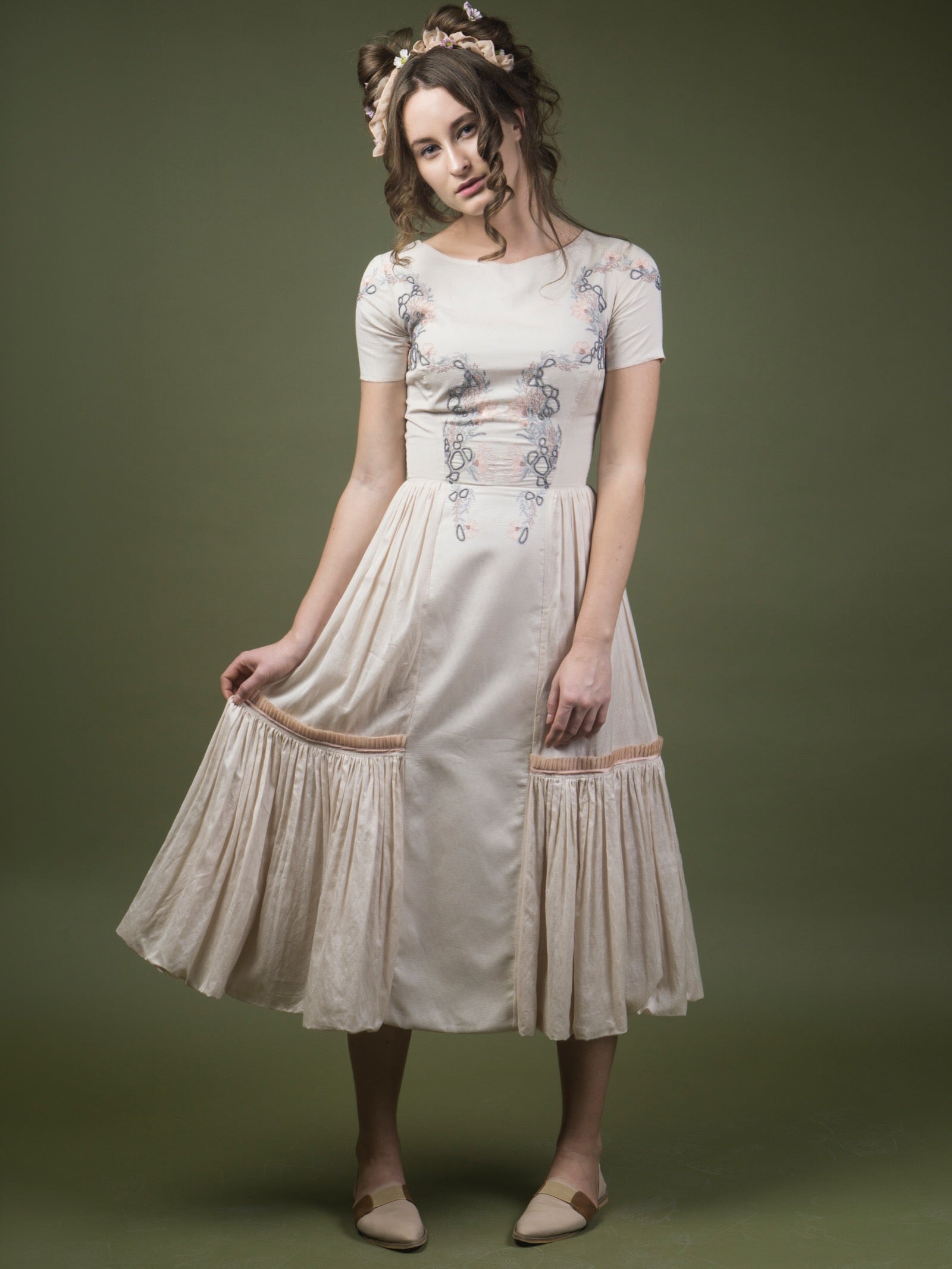 Floral embroidered calf length dress. image 0