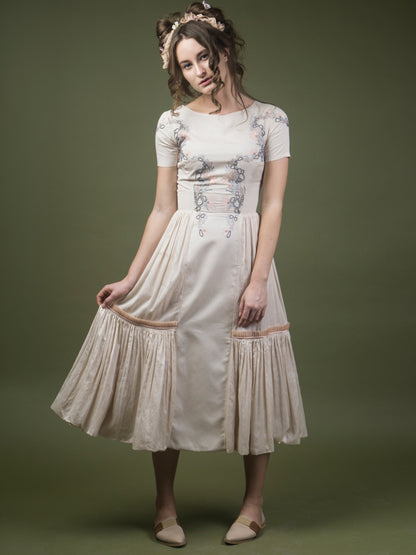 Floral embroidered calf length dress. image 0