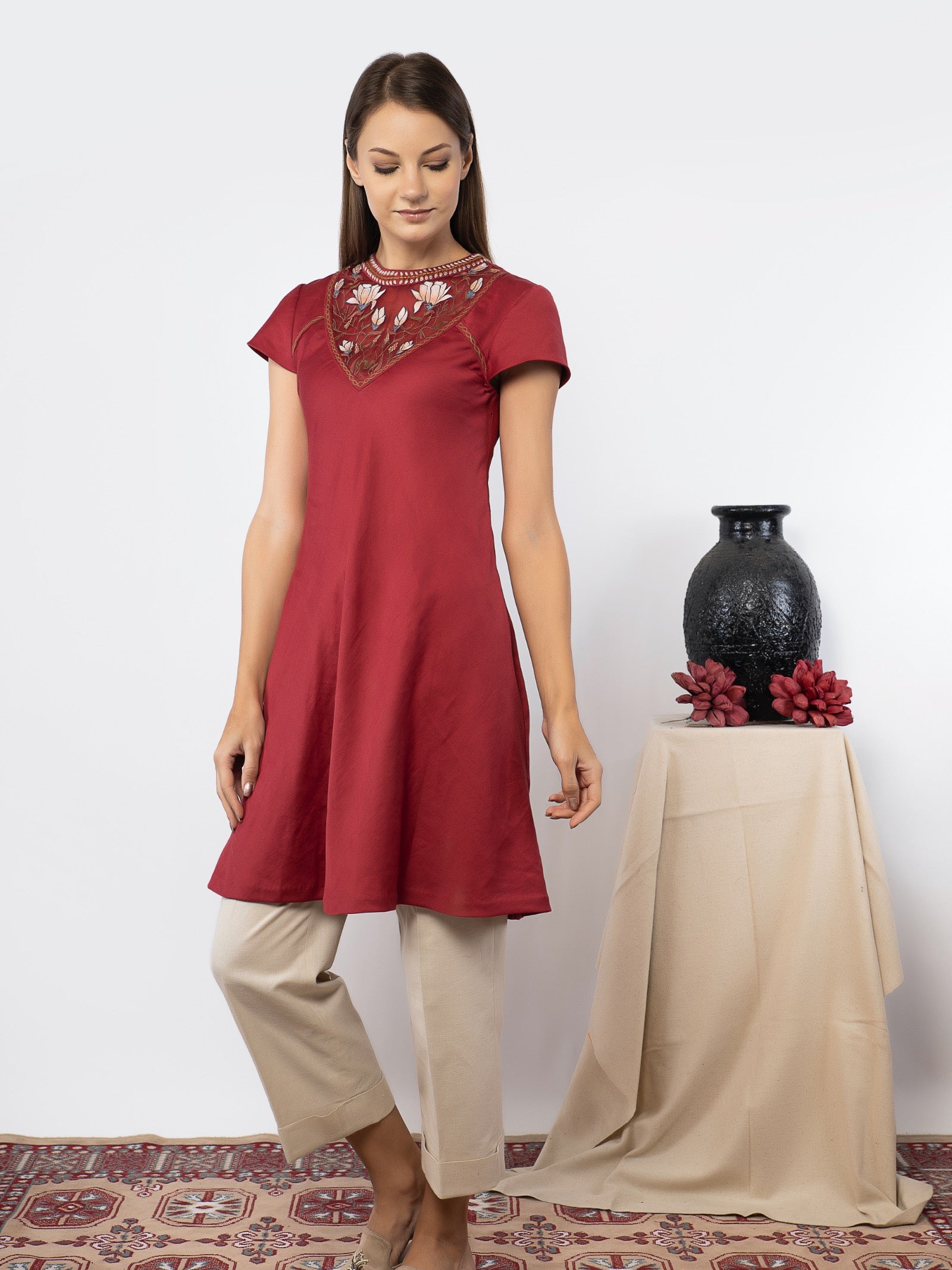 Red tunic with linen pants. image 1