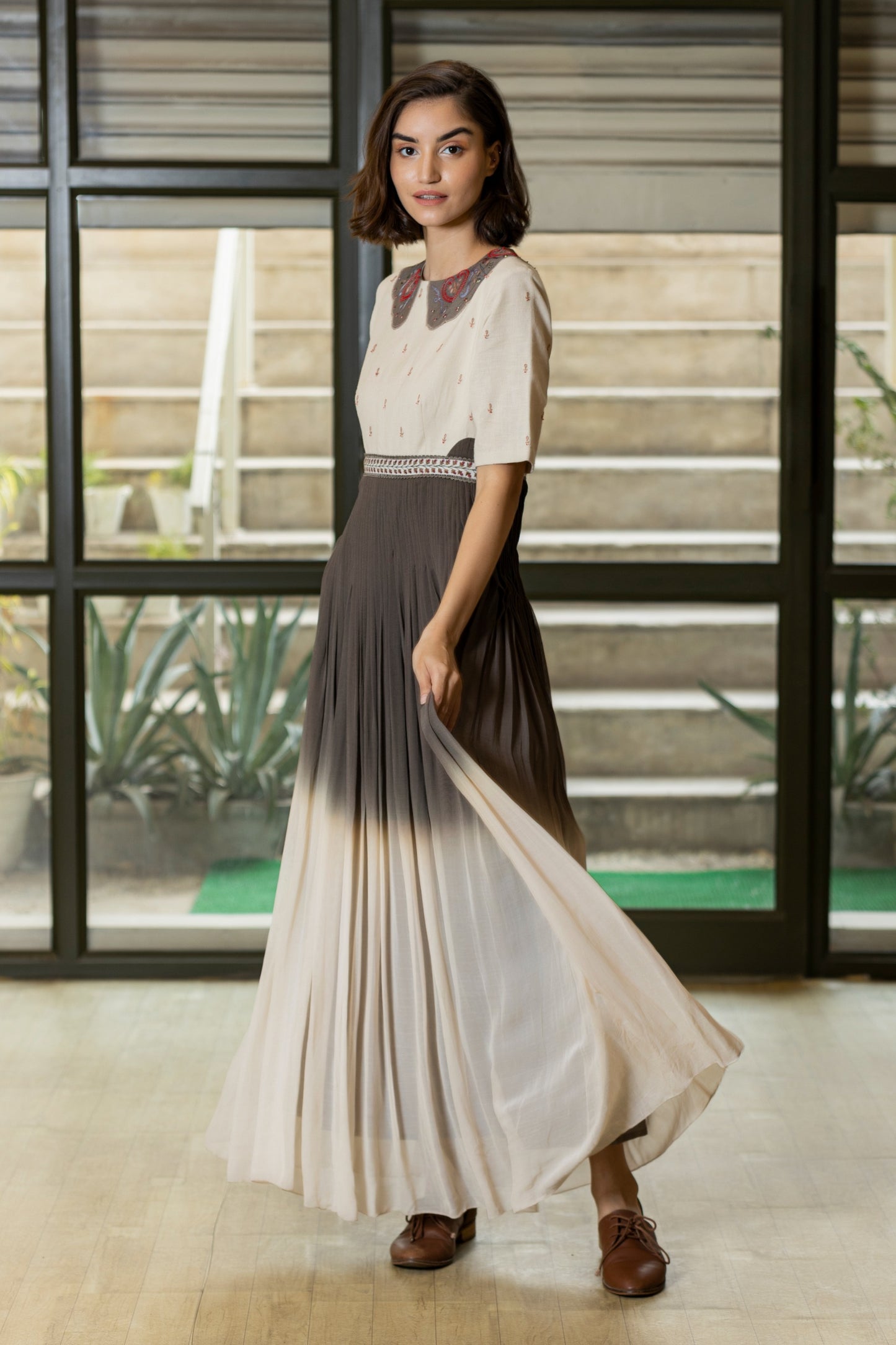 Linen embroidered and georgette pleated collar gown. image 1