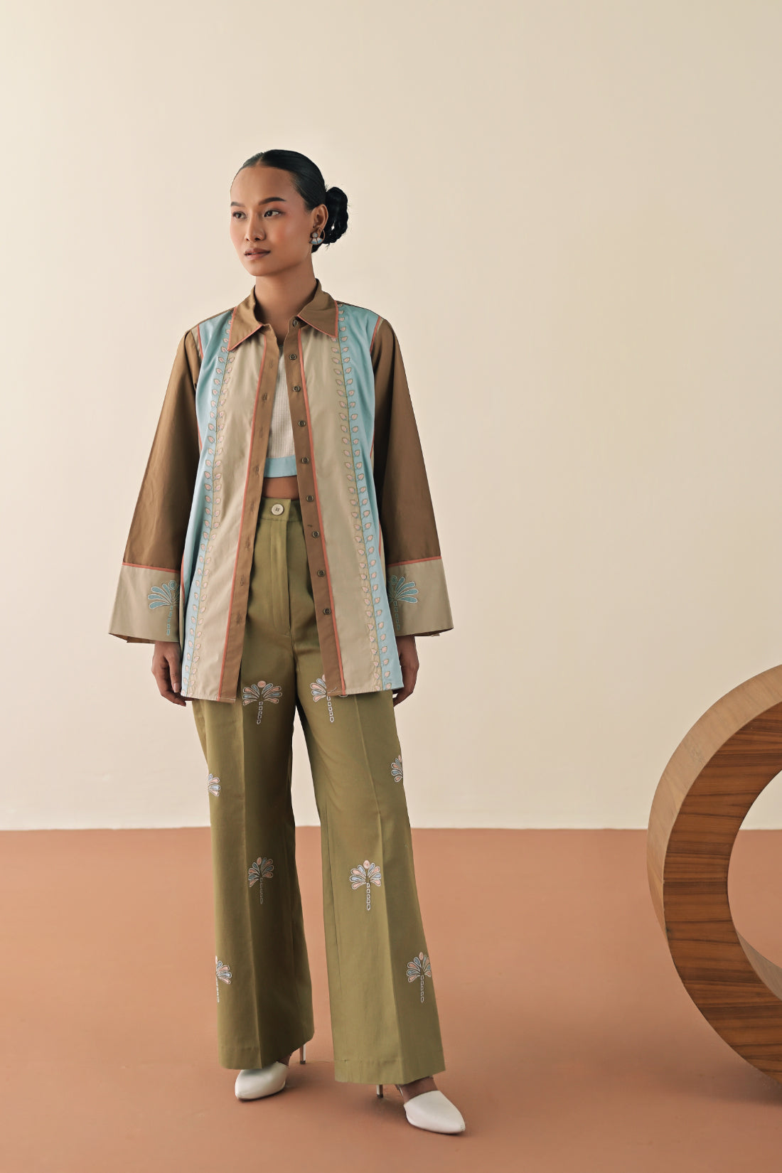 Motley shirt with olive embroidered pants image 2