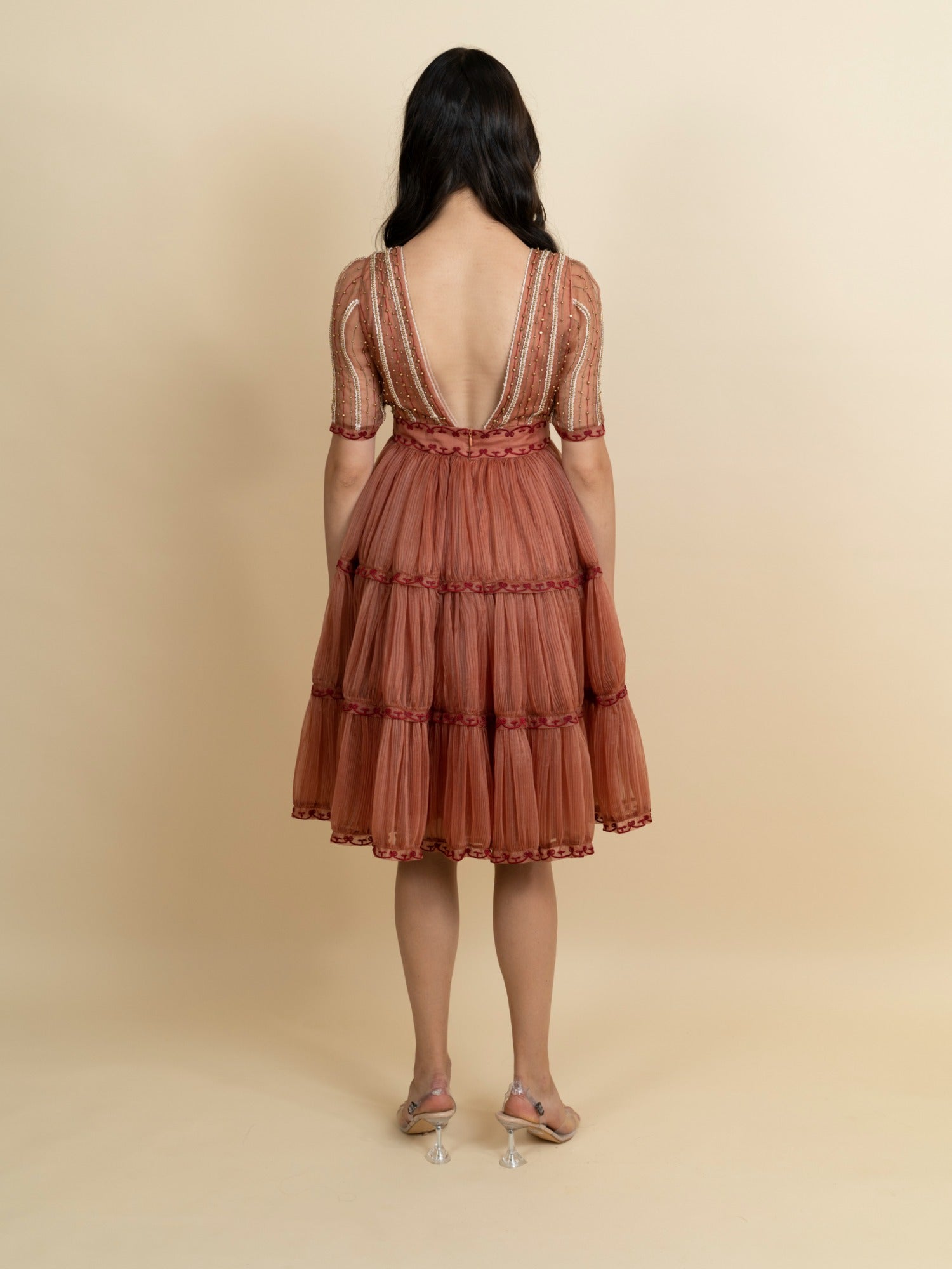 Golden galaxy embroidery in narrow pleated dress. image 3