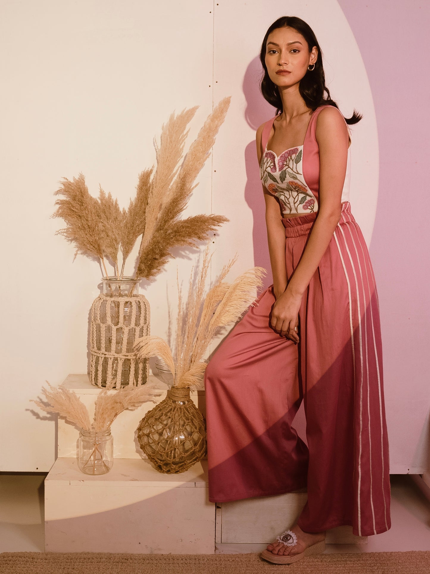 Embroidered crop top with pink flare pants image 1