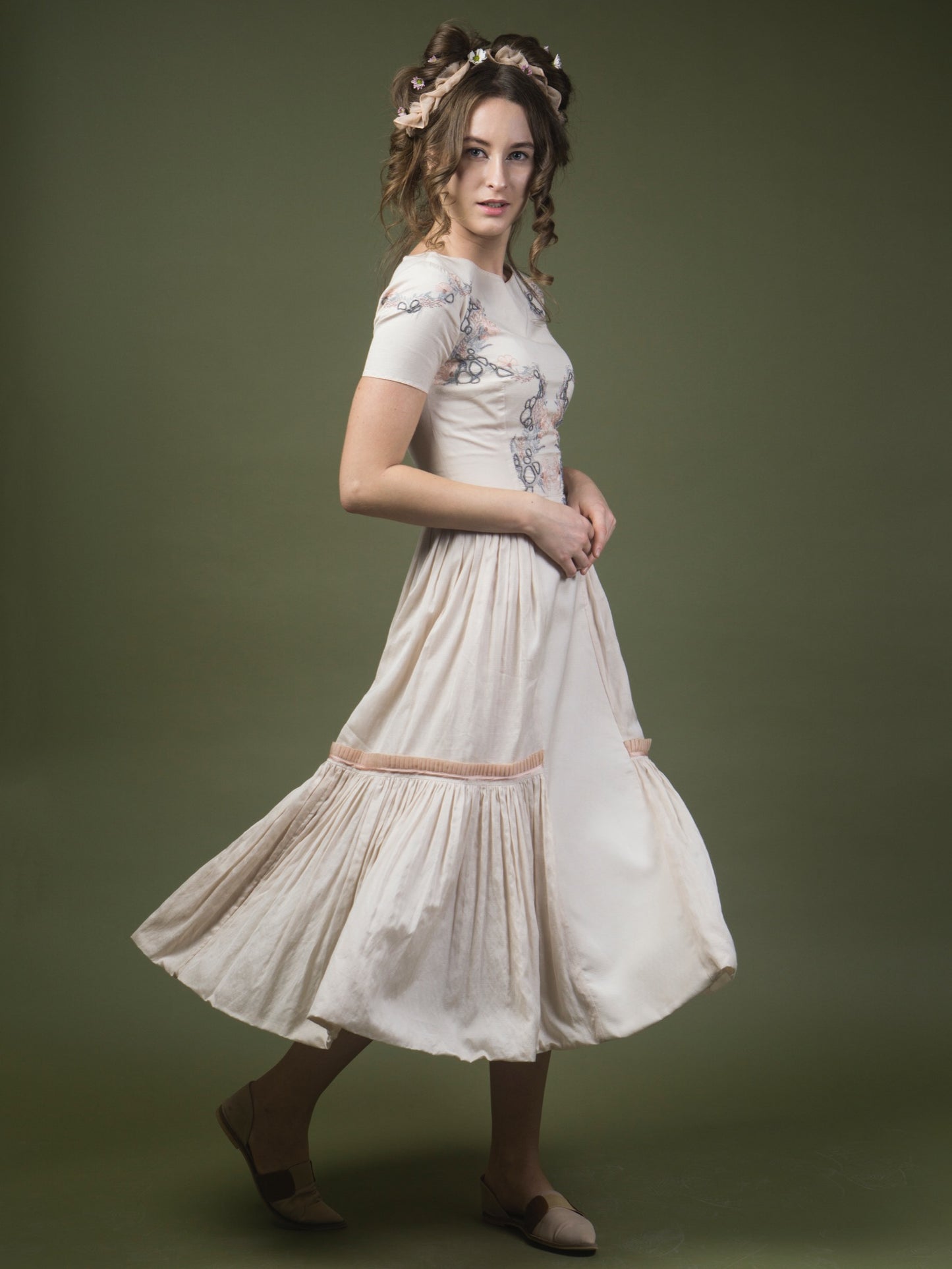 Floral embroidered calf length dress. image 1