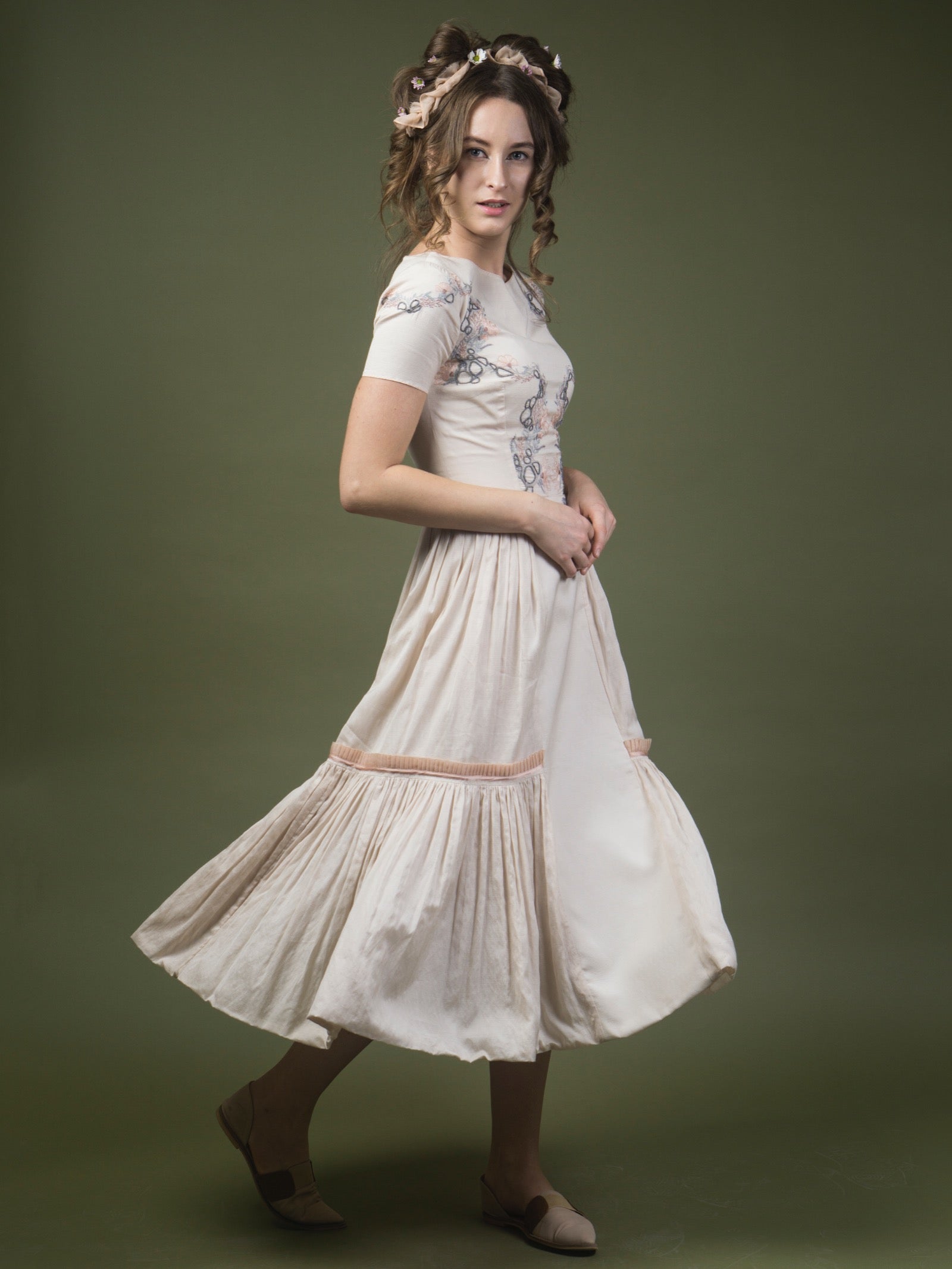 Floral embroidered calf length dress. image 1