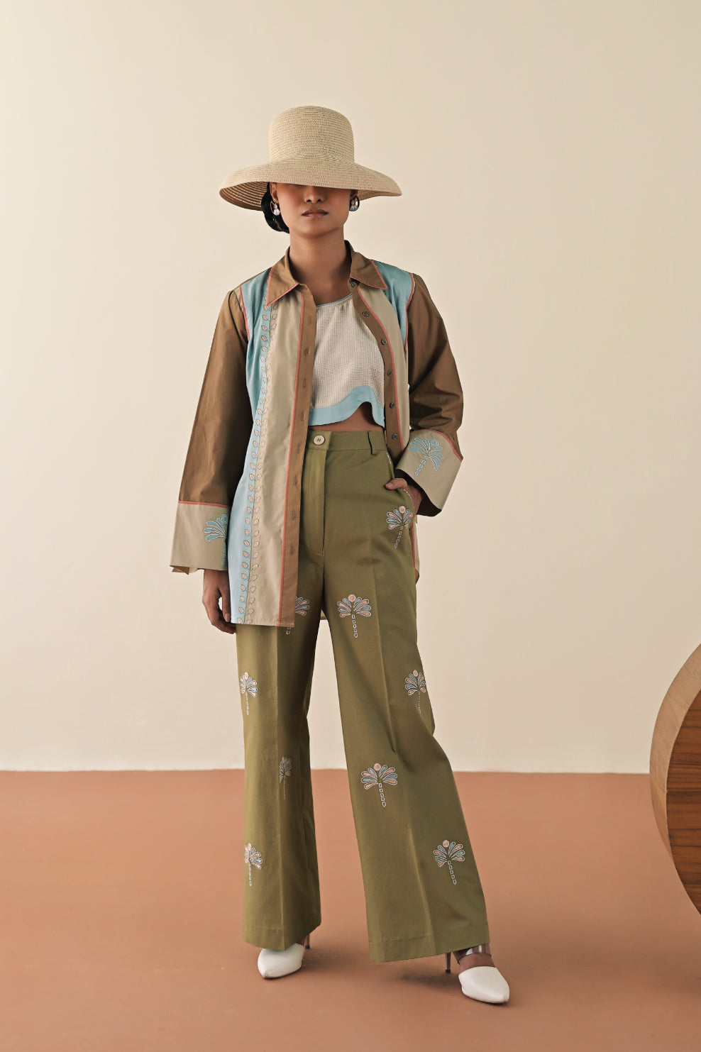 Motley shirt with olive embroidered pants image 0