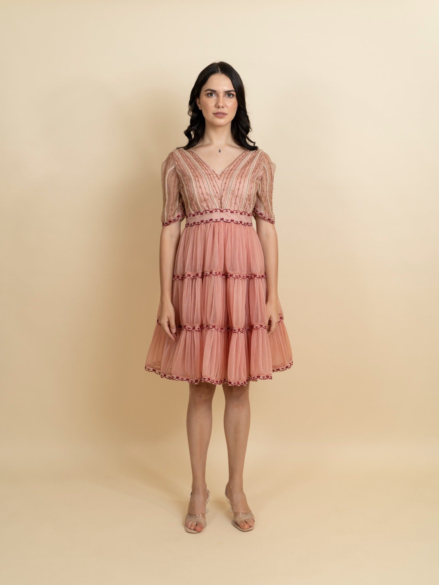 Golden galaxy embroidery in narrow pleated dress. image 0