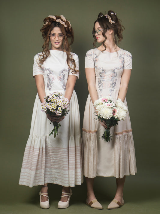 Floral embroidered calf length dress. image 0