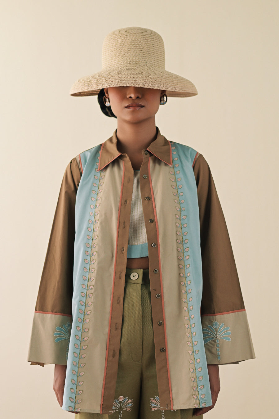 Motley shirt with olive embroidered pants image 1