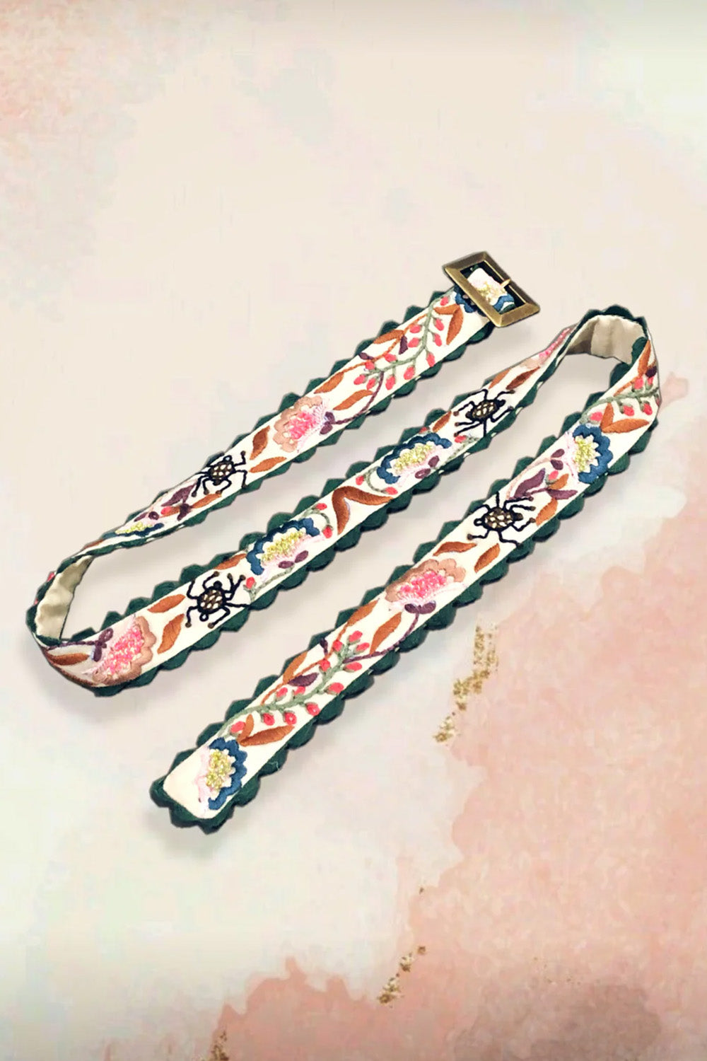 Multi-colored embroidered belt.