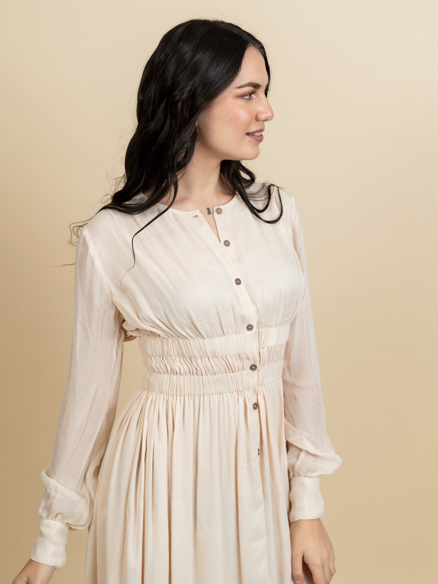 Ivory georgette knee length dress. image 0